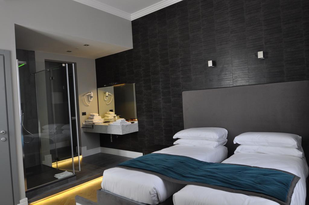 Place 24 Suites & Wellness Roma Quarto foto