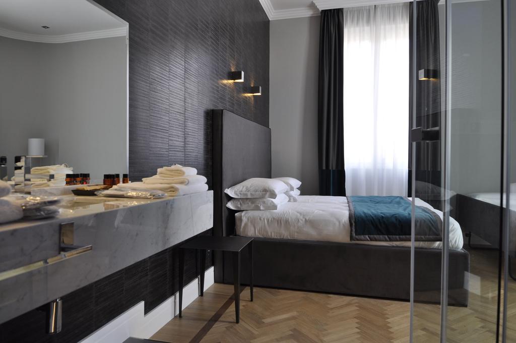 Place 24 Suites & Wellness Roma Quarto foto