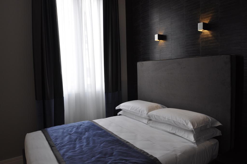 Place 24 Suites & Wellness Roma Quarto foto