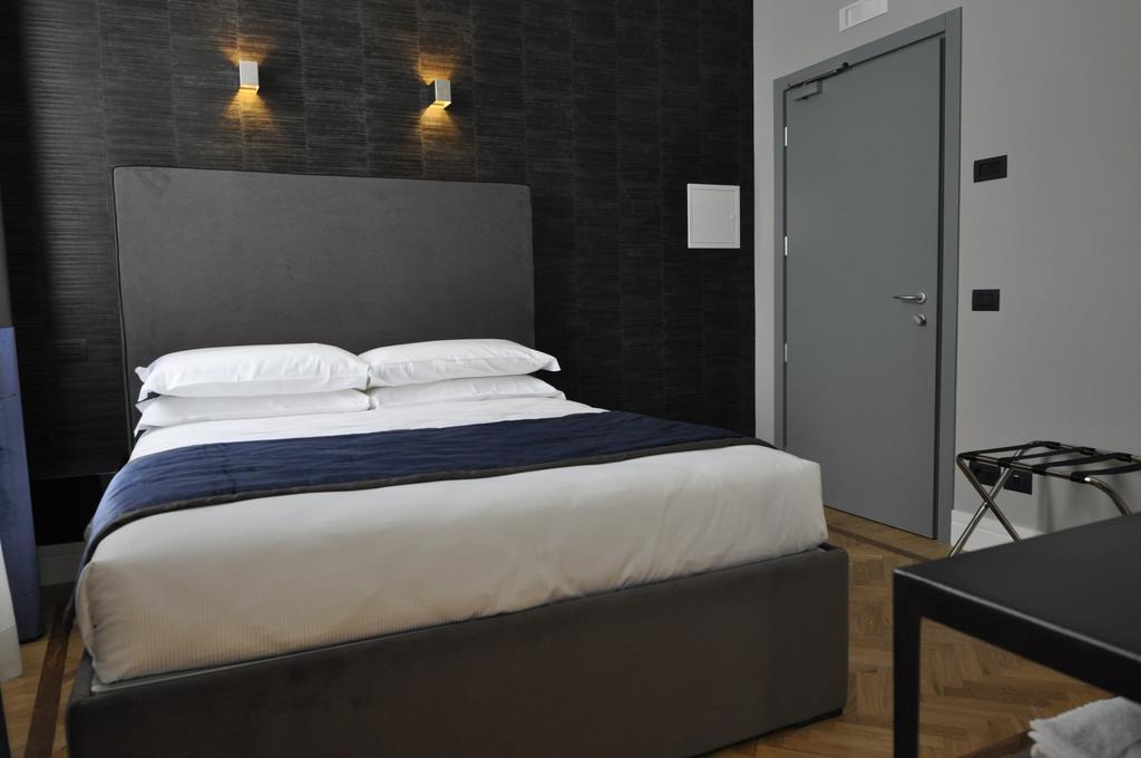Place 24 Suites & Wellness Roma Quarto foto