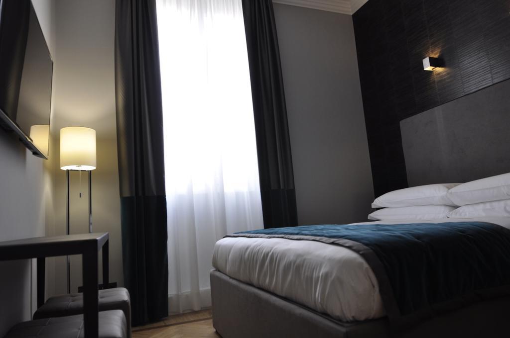 Place 24 Suites & Wellness Roma Quarto foto